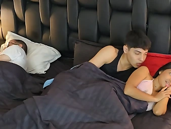 Steamy stepsister shares couch with stepbro & his parents, and we get Steamy and heavy behind his back