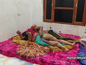 Devi, the lush Indian MUMMY, gets rode by the brush Desi husband's ample Desi fuckpole upon a saree